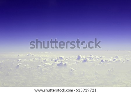 Abstract blurred photo image of cloudscape form aerial view, cloud texture in a cloudy sky, shapeless pattern as background