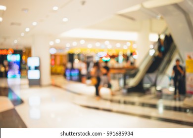 Abstract blurred photo of shopping zone background,Blurred of people walking in shopping mall:blur of department store indoors,blurred of shopping mall.vacation weekend day 