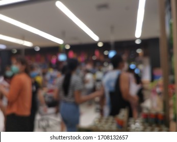 Abstract blurred photo of with trolley in department store bokeh background,Shopping cart in supermarket ,vintage color