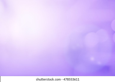 abstract blurred purple color background and glowing light 