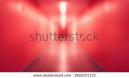 An abstract and blurred red background with a central glowing light tunnel effect, creating a sense of depth and mystery.