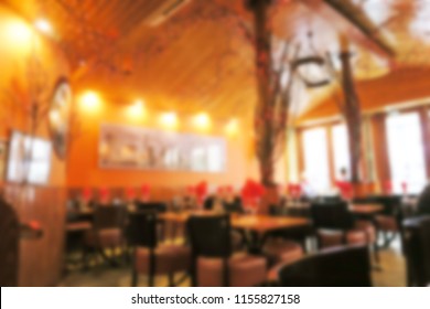 Abstract blurred of red hot style turkish restuarant with warm light for background using.