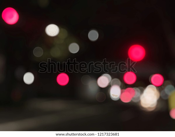 Abstract blurred\
road night light. Bokeh of\
light