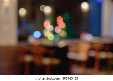 Abstract Blurred Shabu And BBQ Restaurant Interior With Empty Table Sets And Light Bokeh Background.