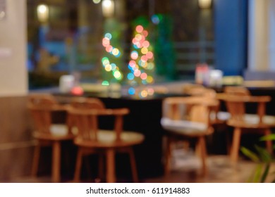 Abstract Blurred Shabu And BBQ Restaurant Interior With Empty Table Sets And Light Bokeh Background.