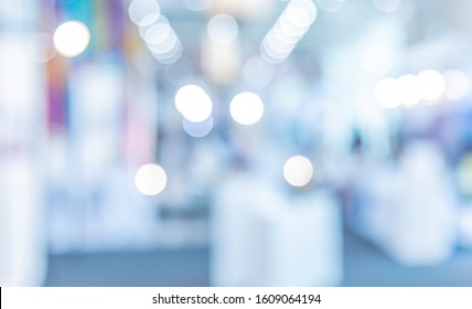 Abstract Blurred Shopping mall or Exhibition hall with bokeh for background usage.