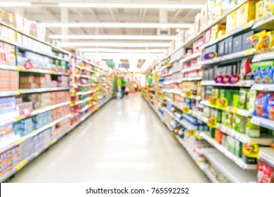 Abstract blurred supermarket aisle with colorful shelves