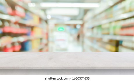 abstract blurred supermarket shelf with grey color concrete panel plank perspective to show ,advertise product on display backdrop for delivery banner concept.