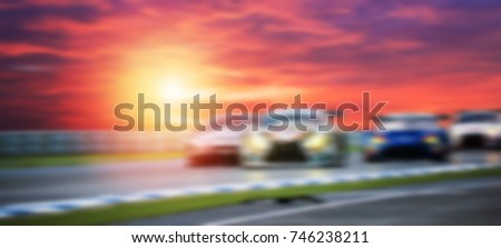 Abstract blurred two super cars battle on speed track, sport concept