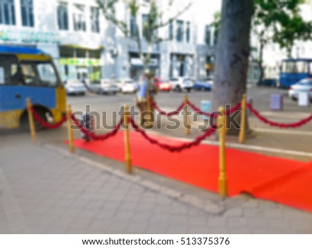 Abstract blurred Way to success on the red carpet (Barrier rope)                               