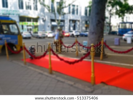 Abstract blurred Way to success on the red carpet (Barrier rope)                               