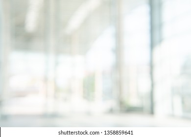 Abstract blurred white doctor medical office room background concept for blur empty space grey modern hospital clinic pharmacy, light clean interior retail sale, blue glare window hallway building