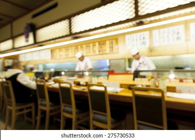 Abstract blurry image of sushi restaurant