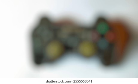 Abstract blurry image of a video game controller. Concept of gaming, technology, leisure, and entertainment. - Powered by Shutterstock