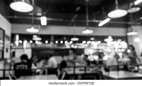 Abstract Blurry Scene Of Inside Restaurant Pub And Bar , Crowd In Public- Black And White 