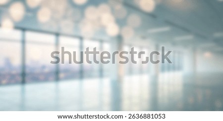 Abstract blurry shot capturing the light and space of a contemporary interior design. It features large windows with natural bright light. The image conveys a sense of modern simplicity.