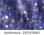 Abstract bokeh background blue colored background, natural glare from lights, white blue monochrome photo, gradient color, blurred bokeh texture as Glittering aesthetic textured pattern, future dusk