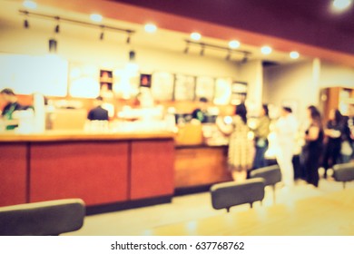 Abstract bokeh and blur coffee shop cafe and restaurant interior for background - Vintage Filter