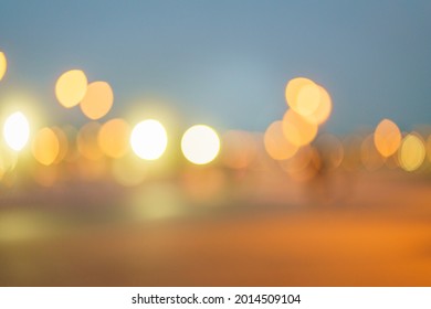 Abstract Bokeh Night Flashlight In City Background, Lights Of Car, Blur From Headlights, Roads Lights. Selective Focus, Twilight Colorful Fog, Haze Backdrop, Defocused Image, Soft Focus On Background