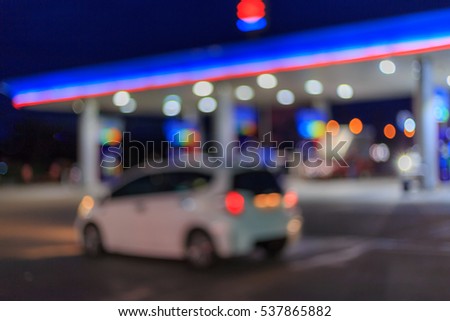 Abstract bokeh at night in gas station.