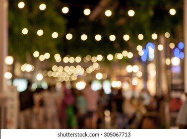 Abstract Bokeh In Night Shopping Mall For Background