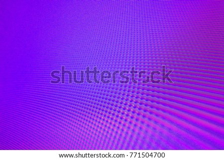 An abstract bright purple background with clear blue waves, interference, moire