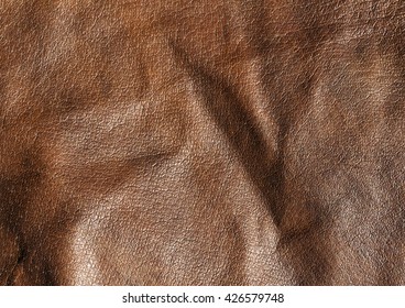Abstract brown leather texture. Background and texture for design.