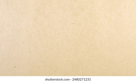 Abstract brown recycled paper background.
Old Kraft paper texture box craft stripes pattern.
top view.