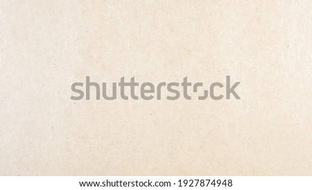 Abstract brown recycled paper texture background.
Old Kraft paper box craft pattern.
top view. Сток-фото © 