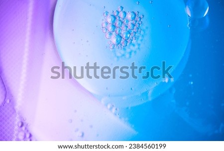 Abstract bubbles floating background. Liquid blue abstract backdrop. Flowing colorful abstract rounds texture. Beautiful blue and violet art design. Liquid. Wallpaper. Flowing Surface