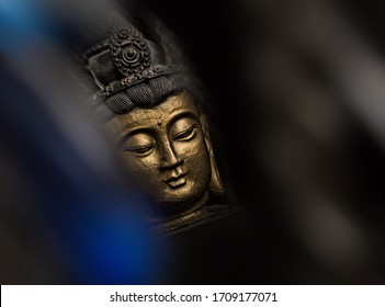 abstract buddha statue with artistic bokeh