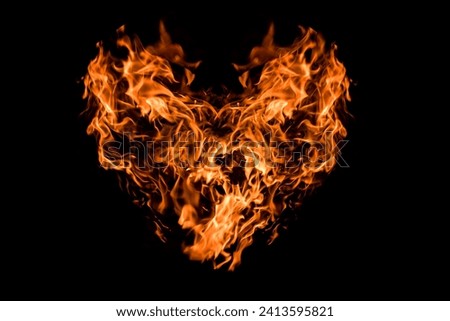 Abstract burning heart isolated on black background. Fire heart 