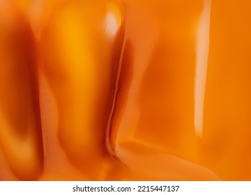 Abstract Caramel textured background. Caramel wallpaper. Pattern Stockfotó