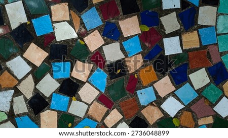 Abstract ceramic tile floor texture with irregular shapes.