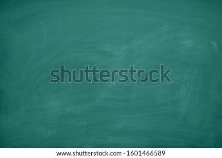 Abstract Chalk rubbed out on greenboard or chalkboard texture. clean school board for background or copy space for add text message. Backdrop of Education concepts.