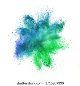 Abstract Chaotic Powder Or Dust Explosion In Green And Blue Colors On A White Background With Copy Space.