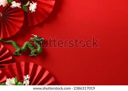Abstract Chinese New Year 2024 Art - Festive Dragon with folding paper fans and sakura on red background 