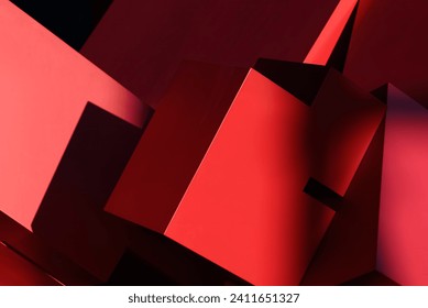 Abstract close up of red and black geometric metallic structure in light and shadow - Powered by Shutterstock