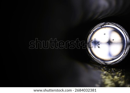 Abstract Close-Up of a Bubble-Laden Sphere in a Dark Tunnel