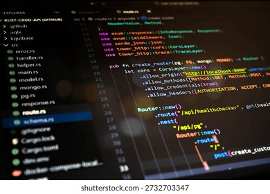 Abstract close-up of colorful programming code displayed in a software development environment, representing backend development, system logic, web services and modern digital technology concepts.