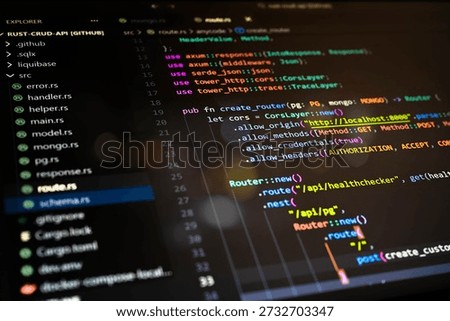 Abstract close-up of colorful programming code displayed in a software development environment, representing backend development, system logic, web services and modern digital technology concepts.