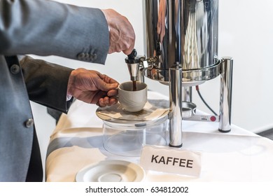 Abstract Coffee Tea Cup With Coffee Dispenser Business People Taking One