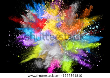 abstract colored dust explosion on a black background.abstract powder splatted background,Freeze motion of color powder explodingthrowing color powder, multicolored glitter texture.