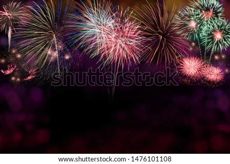 Abstract colored firework object background with free space for text. Variety of colors Mix Fireworks or firecracker burst collections isolated on black  background. celebrate holiday travel outdoor.