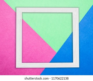 Abstract Colored Paper Blue Pink  Greenbackground Empty Picture Frame