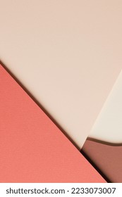 Abstract colored paper texture background. Minimal paper cut style composition with layers of geometric shapes and lines in shades of beige and brown colors. Top view