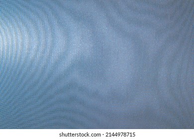 abstract colored wavy background of interference overlay fine meshes, combination of light and shadow, toning