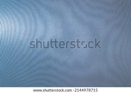 abstract colored wavy background of interference overlay fine meshes, combination of light and shadow, toning