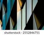 Abstract Colorful Architectural Facade with Interplay of Light, Shadows, and Angular Geometric Patterns