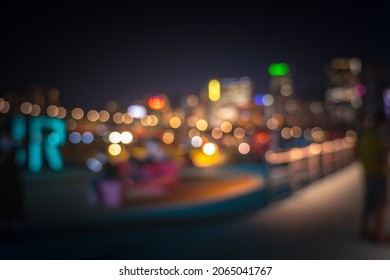 Abstract colorful circular bokeh with city background - Shutterstock ID 2065041767
